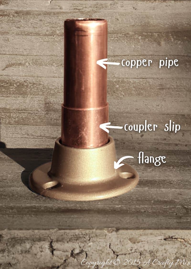 Insert the copper coupler into the flange and then insert the copper pipe