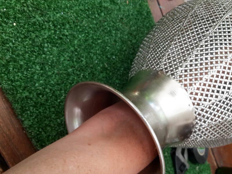 Place the light fitting inside the metal urn
