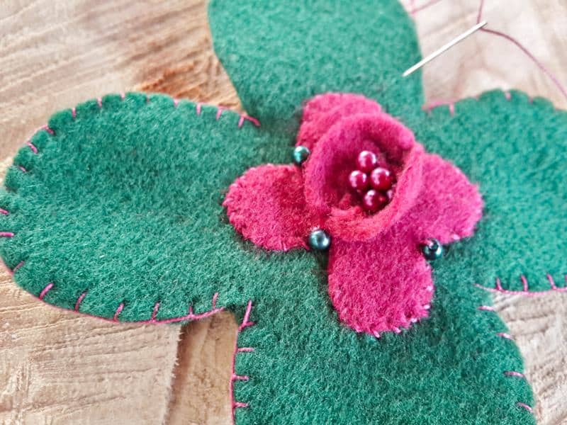 Add beads for a touch of elegance and use blanket stitch to sew the shapes together
