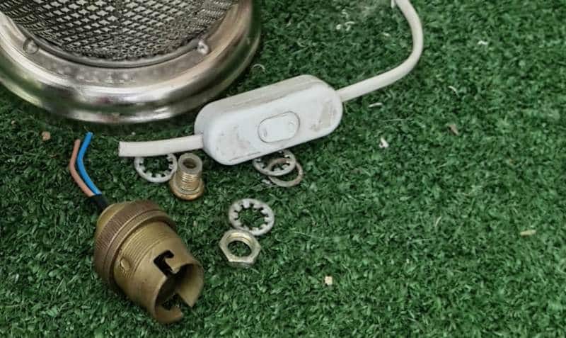 If your light fitting clashes with the urn, you can spray it a different color