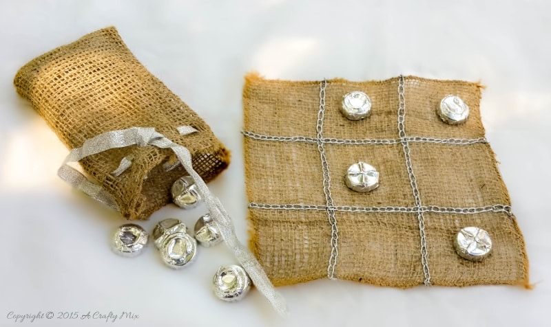 Repurpose bottle tops and make this easy tic tac toe in a bag. #ACraftyMix