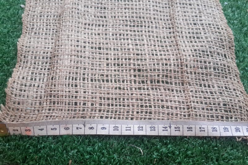 Cut a square out of the hessian and zig zag the edges