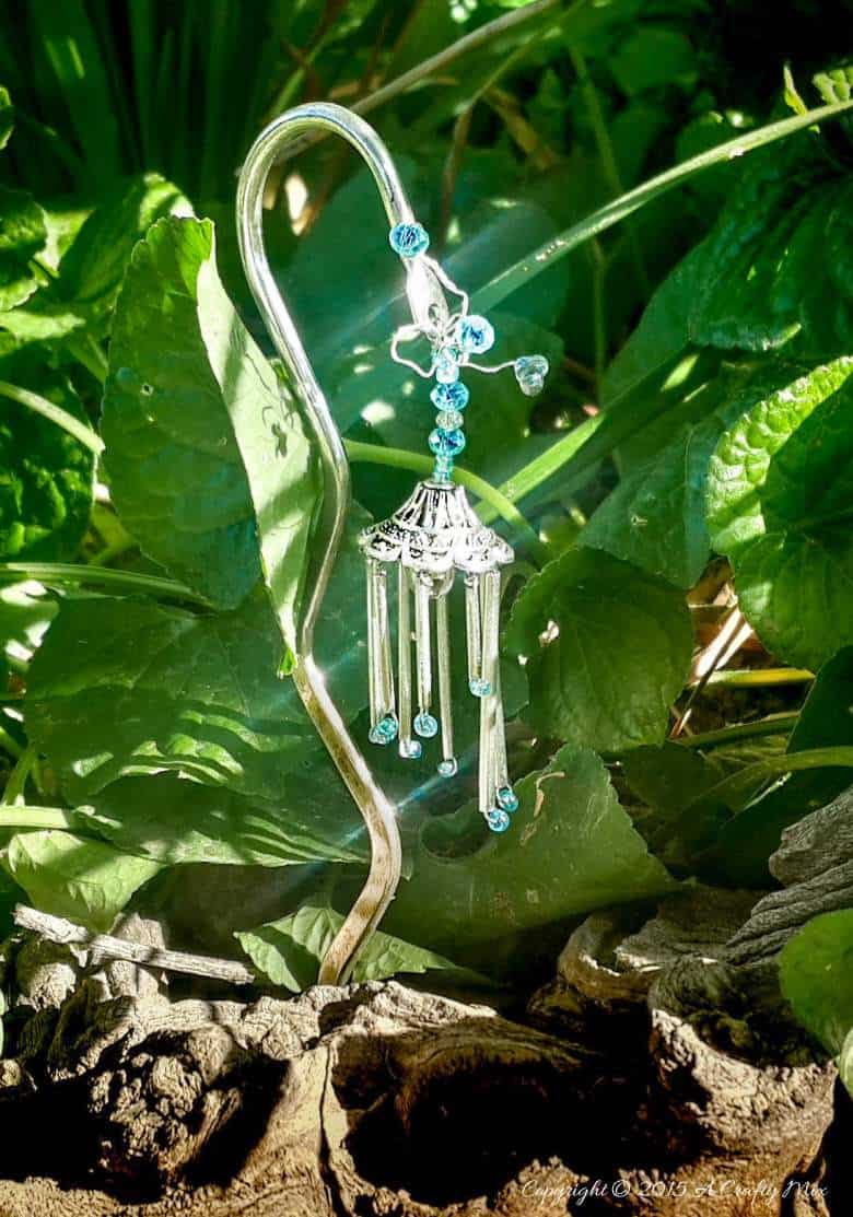 A Quick and Easy tutorial that will show you how to make Fairy Wind Chimes. #fairywindchimes #fairygarden #acraftymix #fairytutorial