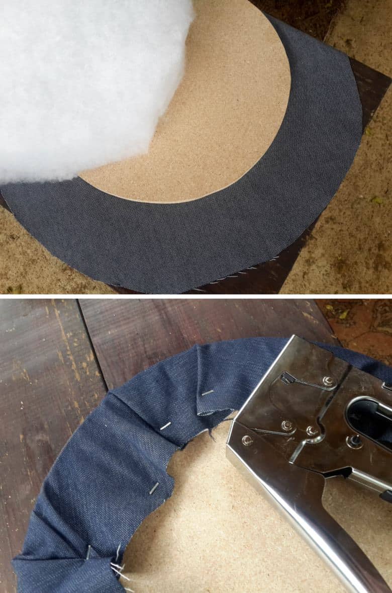Add batting to the circle and staple the denim fabric down
