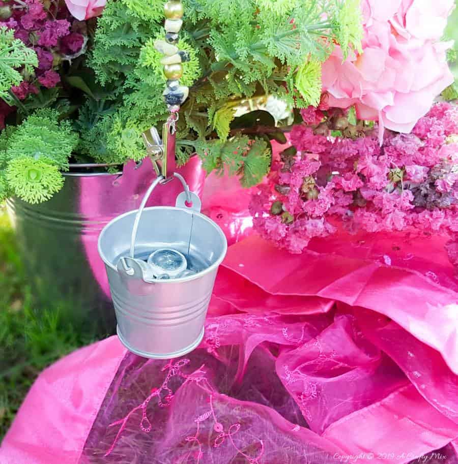 How to make your own tablecloth weights using basic craft supplies. #tableclothweights #tabledecor #DIYTableClothWeights #SpringDecor