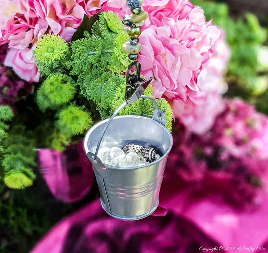How to make your own tablecloth weights using basic craft supplies. #tableclothweights #tabledecor #DIYTableClothWeights #SpringDecor