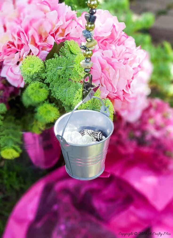 How to make your own tablecloth weights using basic craft supplies. #tableclothweights #tabledecor #DIYTableClothWeights #SpringDecor