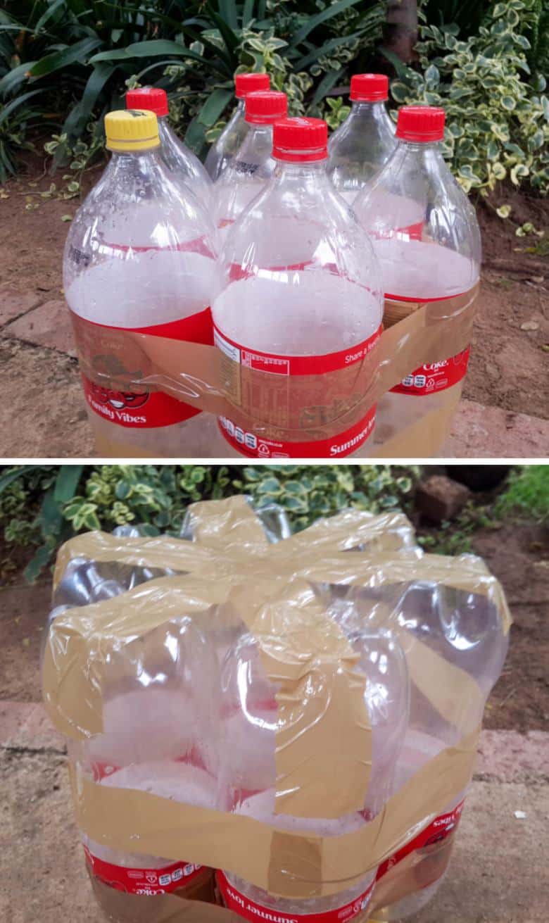 Use duct tape to tape the bottles together