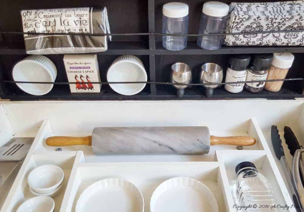 When two totally unrelated things come together they make magic. Kitchen Island kinda magic. A fishing tackle box and old office storage are repurposed into this beautiful island. #DIYHomeDecor #DIYKitchenIsland #RepurposingIdeas #FishingTackleBox