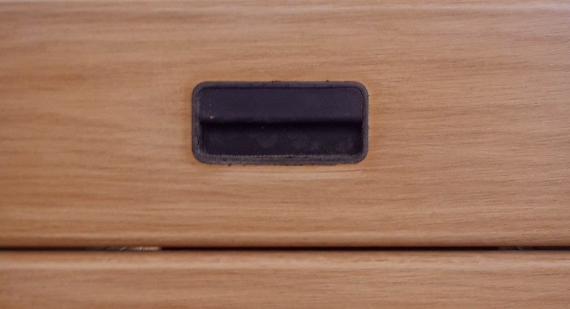 Boring handles on old office storage