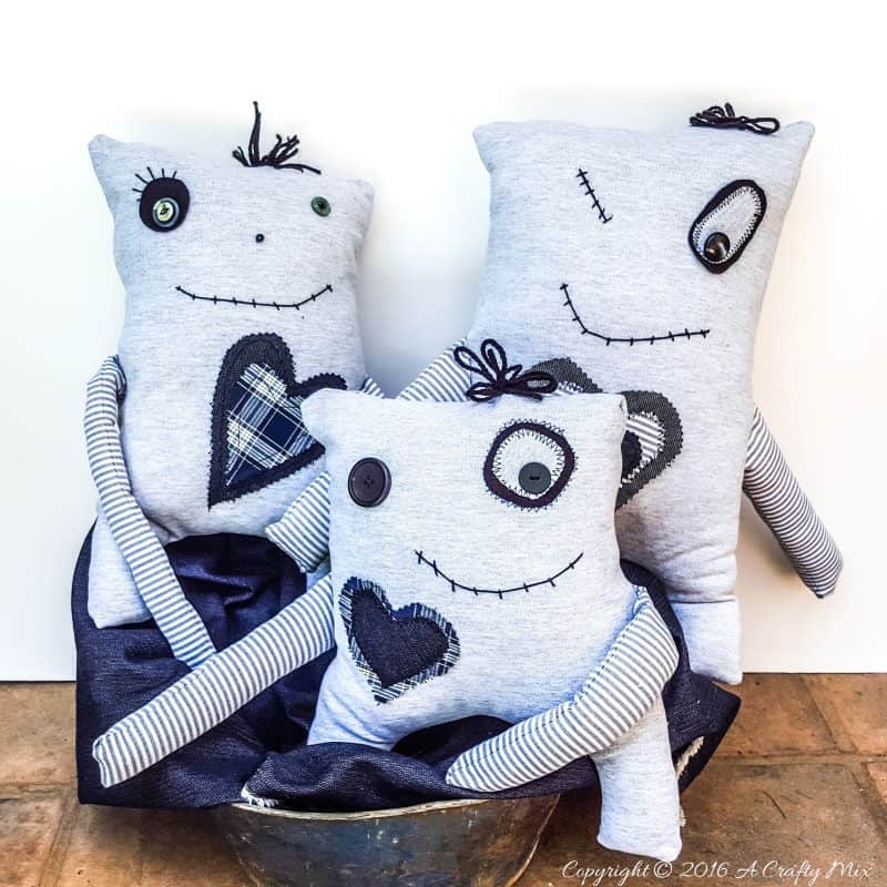 Make your own little Momster. Includes a free easy-to-sew pattern and lots of ideas to customize their little faces. #sewing #momster #ACraftyMix #freepattern