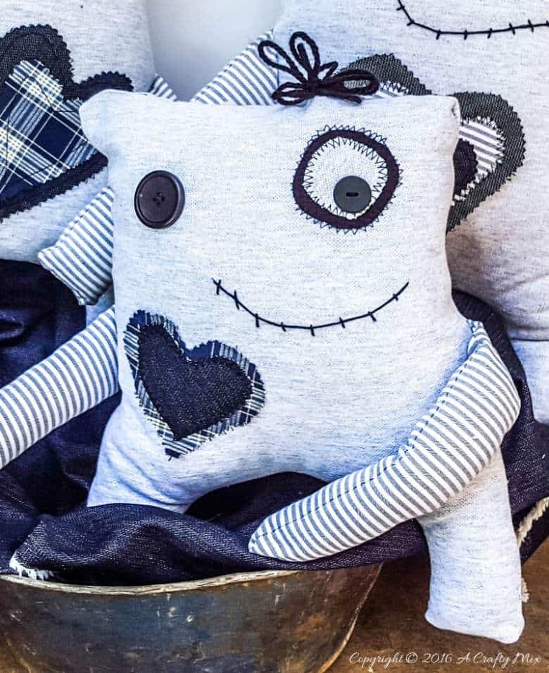 Make your own little Momster. Includes a free easy-to-sew pattern and lots of ideas to customize their little faces. #sewing #momster #ACraftyMix #freepattern