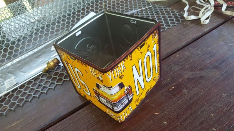 Join the license plates together with pop rivets and small L-shaped brackets