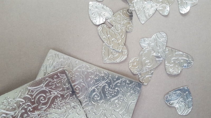 Cut out a whole bunch of heart shapes in different sizes
