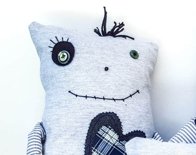 Make your own little Momster. Includes a free easy-to-sew pattern and lots of ideas to customize their little faces. #sewing #momster #ACraftyMix #freepattern