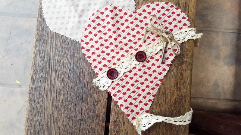Place your fabric scraps on the heart, keeping it simple and innocent