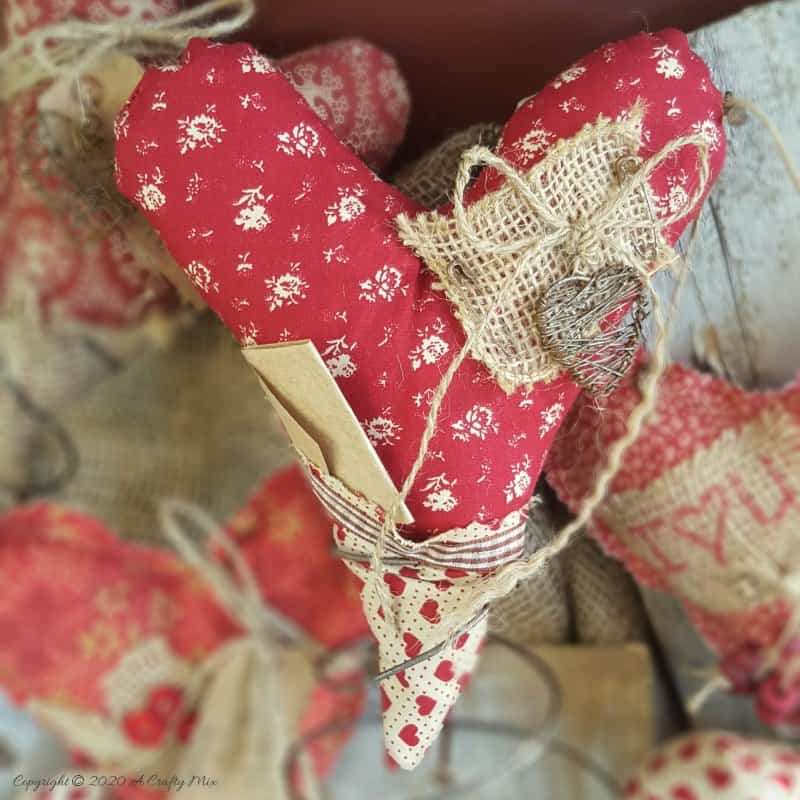 Ever wanted to create something unique for Valentine's Day or to add a little love to your decor? Join us as we show you how to make gorgeous primitive hearts. These heartfelt creations are not only easy to sew but also quick to make - perfect for last-minute gifts or as a delightful addition to your home. The tutorial includes tips to add interest, how to make a bedspring, and free label printables