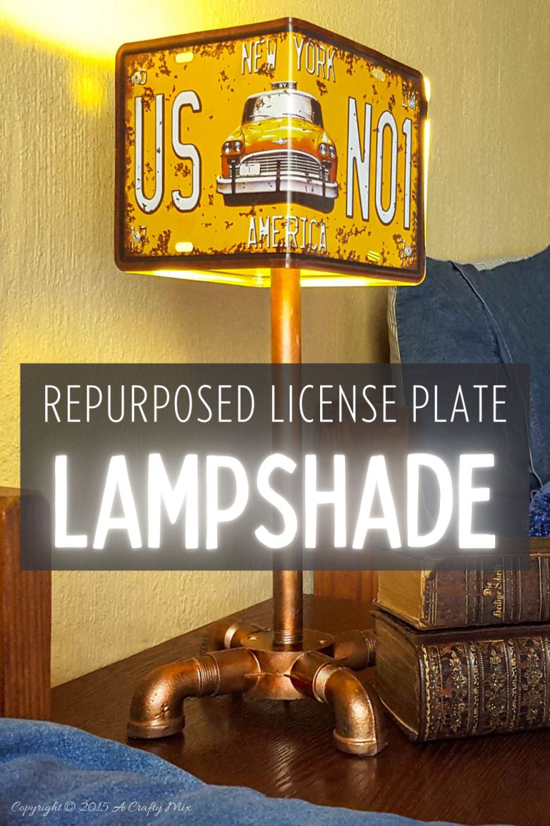 Add a little industrial chic to your decor and make this repurposed license plate lamp using pipes. Perfect for a teens room or man cave. #ACraftyMix #DIYLamp 