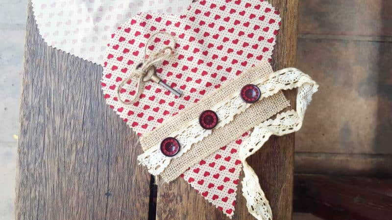Place your fabric scraps on the heart, keeping it simple and innocent