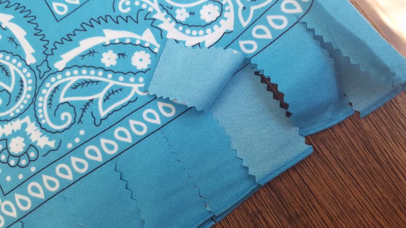 Cut the edge of the bandana heart into strips