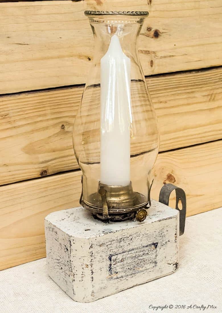 Turn block pallets into these rustic farmhouse lanterns. Quick and easy recycled idea. #pallets #repurposedDecor #ACraftyMix #FarmhouseDecor