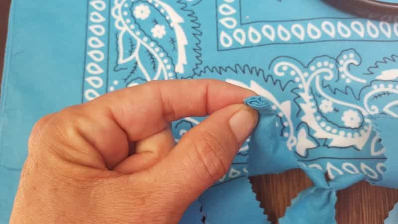 Fold both pieces of the strips tightly together