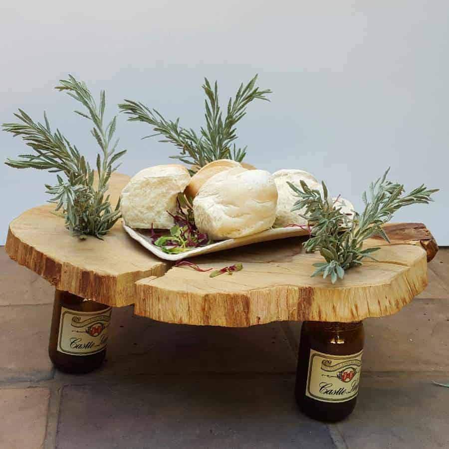 Naturally beautiful wood and bottles centerpiece