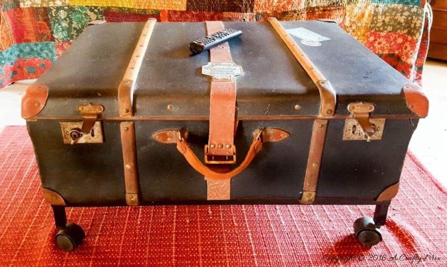 Add some wheels to a large suitcase and it doubles up as both storage and a coffee table