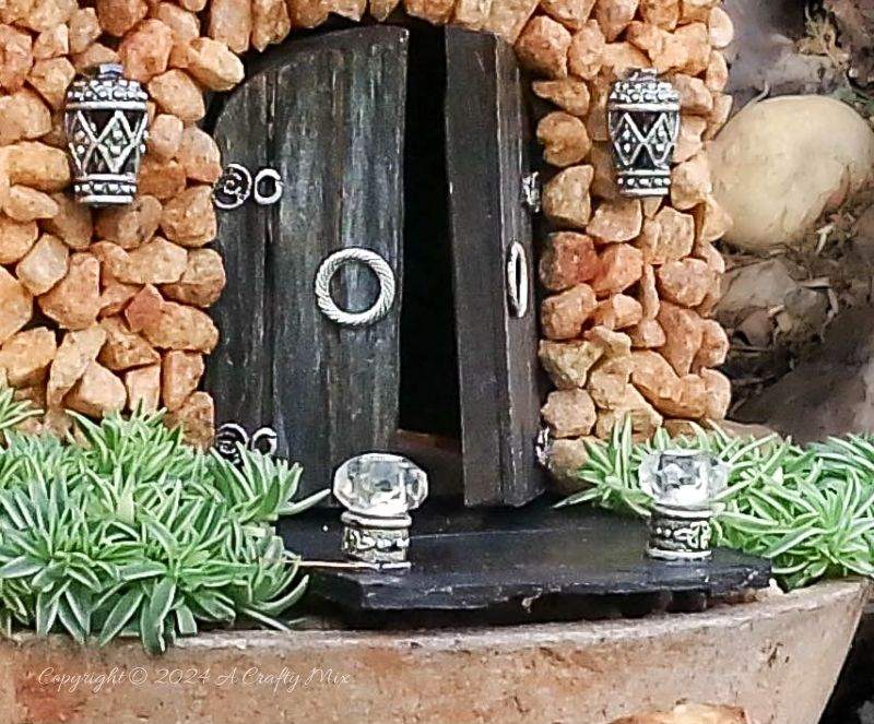 A beautiful addition to a fairy garden. This miniature church was made from a wooden tissue box and coconut fibre. We'll show you how it's done