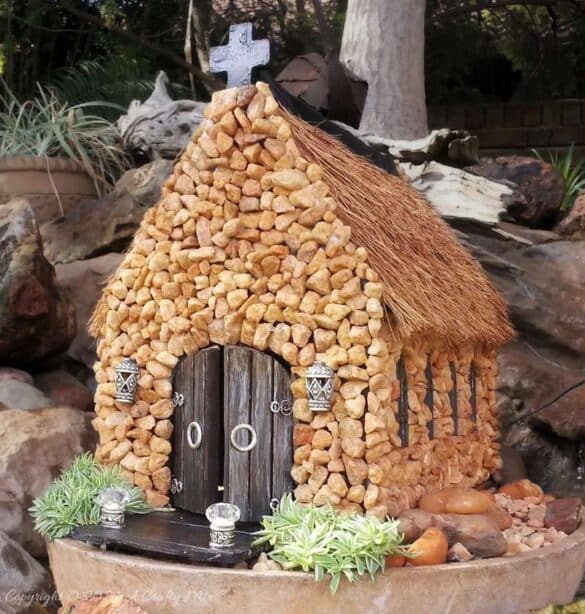 A beautiful addition to a fairy garden. This miniature church was made from a wooden tissue box and coconut fibre. We'll show you how it's done