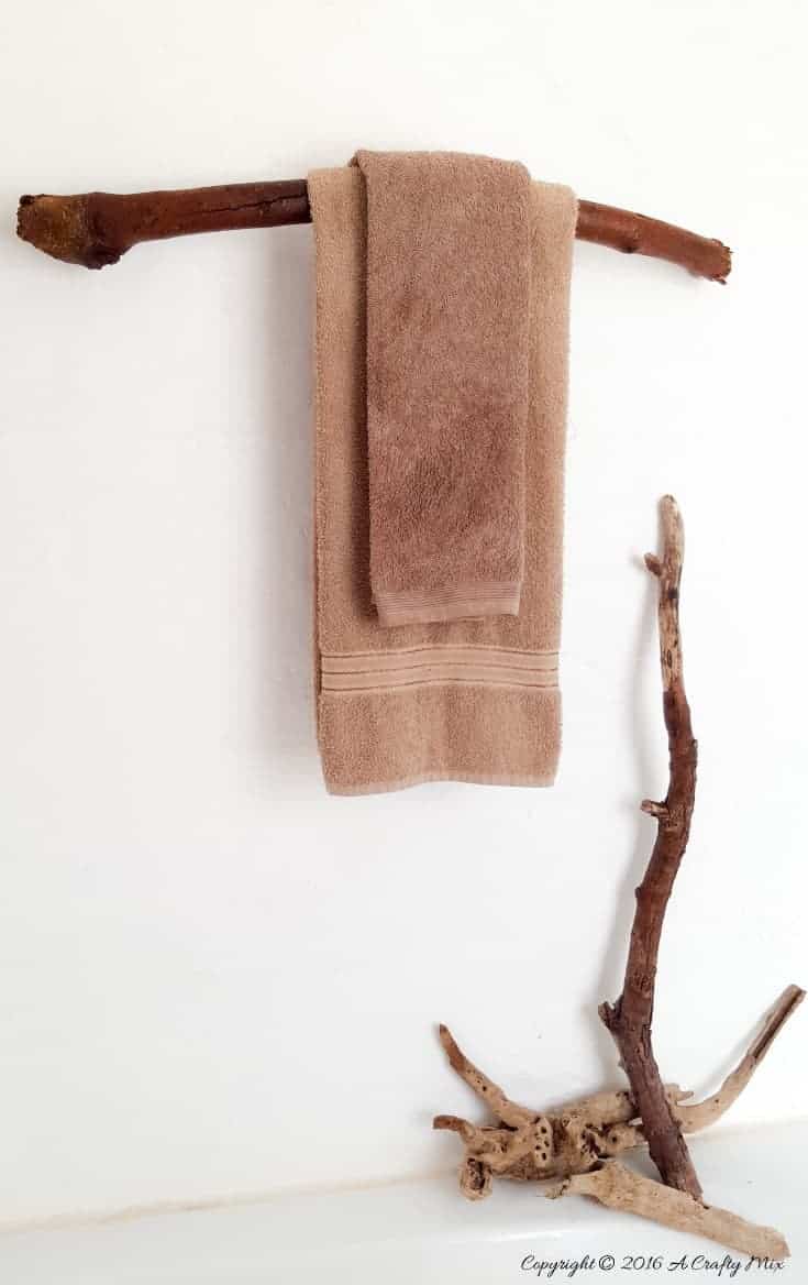 How to make a unique towel rack from a branch. Quick and easy DIY tutorial #DIYHomeDecor #Branchtowelrack #branchrepurpose #DIYTutorial #DIYBathroomdecor #Acraftymix
