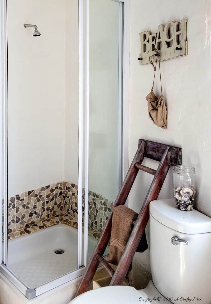 A old ladder holds our towels #ACraftymix #StorageSolutions #SmallSpace