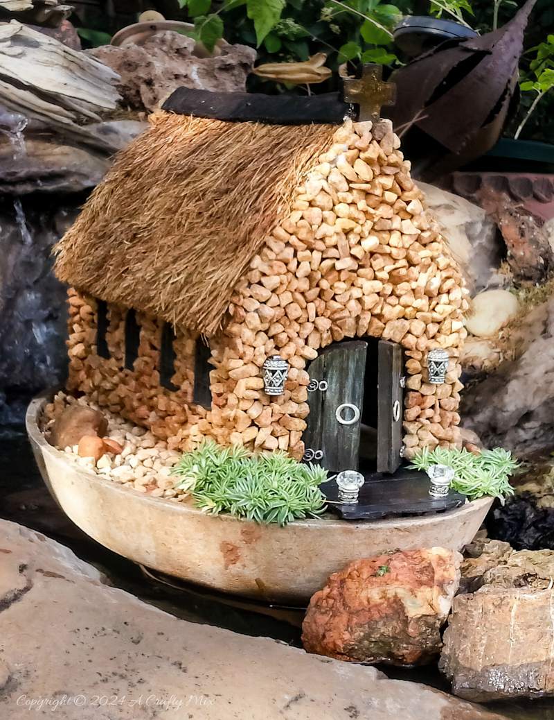 A beautiful addition to a fairy garden. This miniature church was made from a wooden tissue box and coconut fibre. We'll show you how it's done