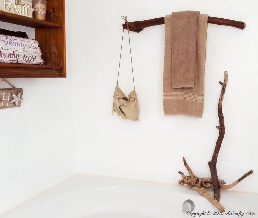 How to make a unique towel rack from a branch. Quick and easy DIY tutorial #DIYHomeDecor #Branchtowelrack #branchrepurpose #DIYTutorial #DIYBathroomdecor #Acraftymix