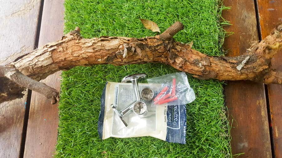 What you need to make a unique branch towel rack. #DIYHomeDecor #Branchtowelrack #branchrepurpose #DIYTutorial #DIYBathroomdecor #Acraftymix