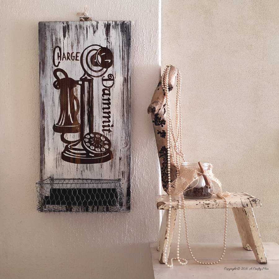 Old cupboard door recycled as a charging station