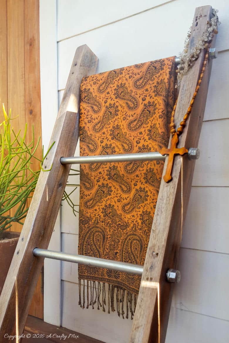 Hang plants, blankets or anything that tickles your fancy on this easy to make industrial chic storage ladder