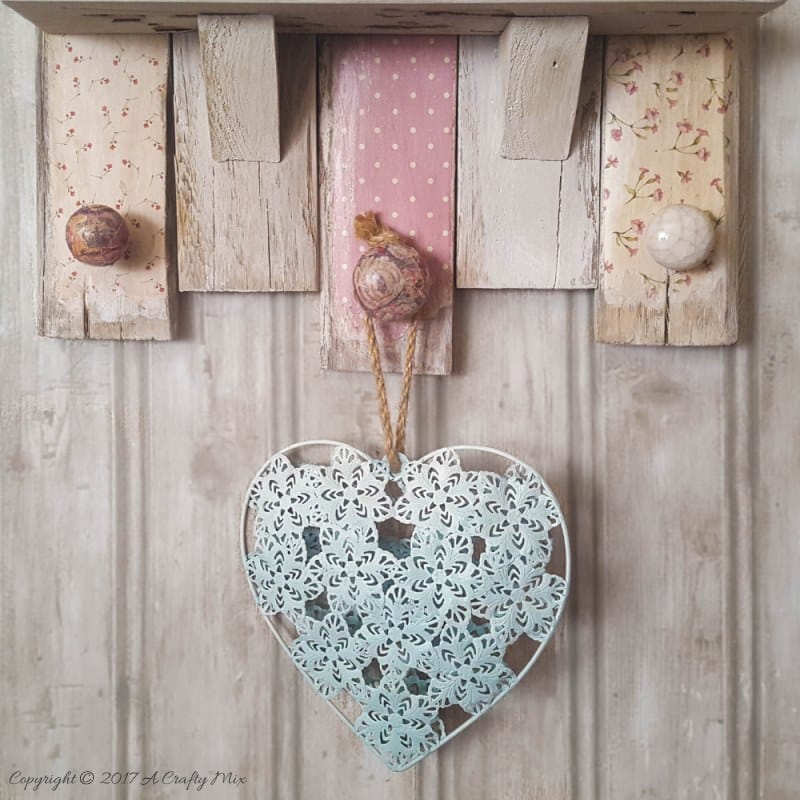 Add a touch of old-world charm to you home decor and make this easy scrapbook shelf with pallets in a morning. #ACraftyMix 