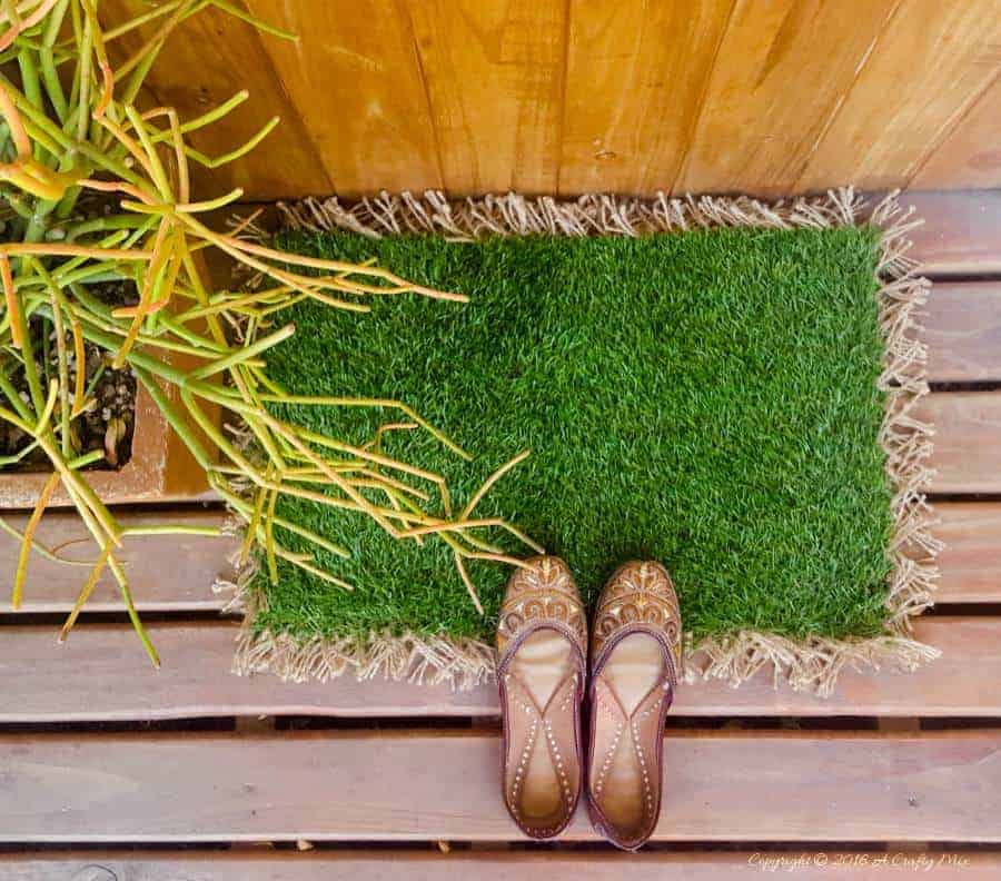 When you can't find a doormat that's the right size for your patio, make your own with AstroTurf #DIYDoormat #CustomDoorMat #ACRaftyMix #OutdoorDoorMat #AstroTurfDoormat #DoormatTutorial
