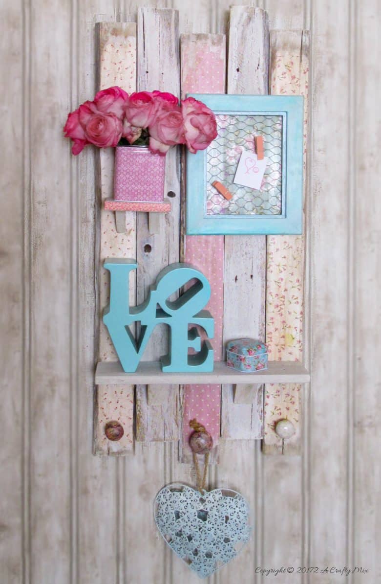 Add a touch of old-world charm to you home decor and make this easy scrapbook shelf with pallets in a morning. #ACraftyMix 