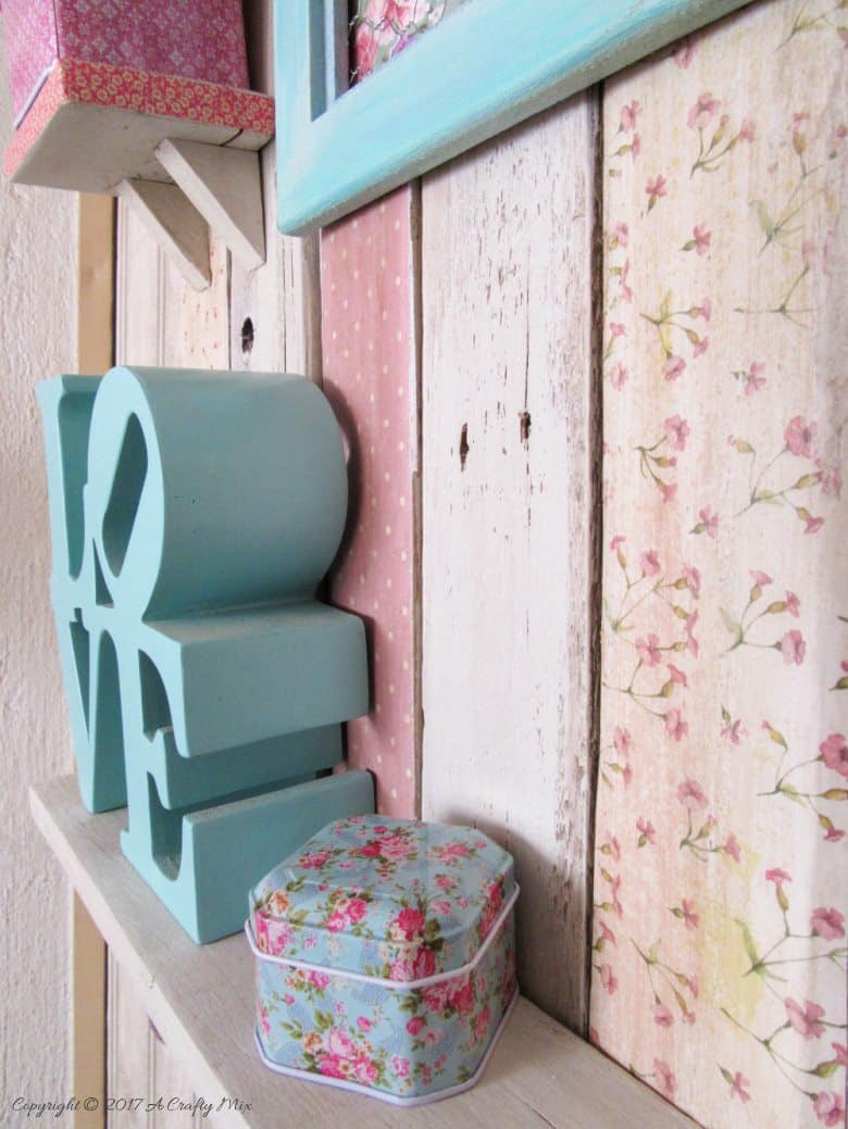 Scrapbook paper can be used to transform pallets and to create an old world charm.