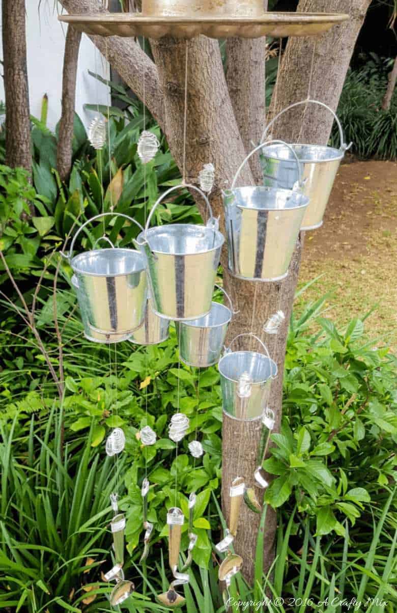 If you enjoy repurposing things, you'll love this easy tutorial that will show you how to turn a jelly mold into a one-of-a-kind wind chime. #windchimeDIY @acraftymix #repuposedwindchime