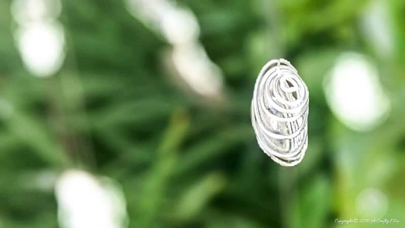 We'll show you how easy it is to make beautiful wire wrapped glass beads and add them to a repurposed wind chime