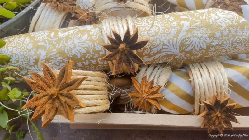 Quick and easy fall napkin rings using cardboard rolls, string and seeds