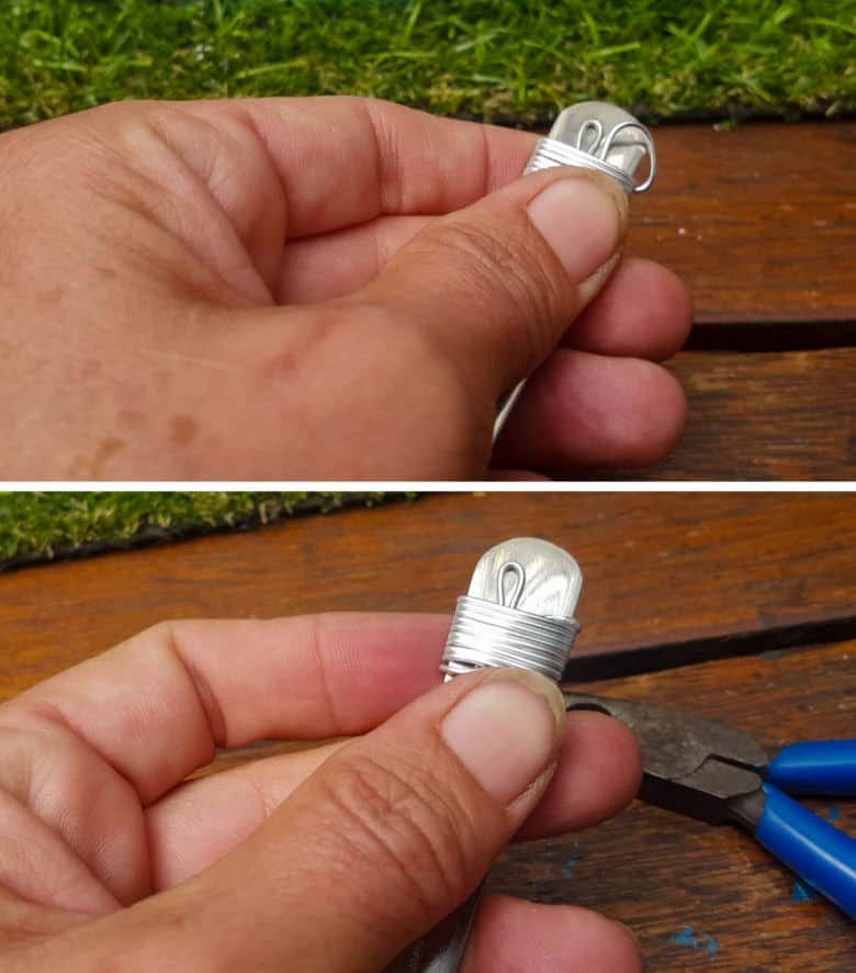 Continue wrapping the wire around the spoon a few times before cutting the wire and tucking the end into the wrapped wire