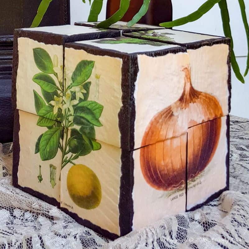 How to make a 3D Block puzzle from scrap wood. Fun, easy and customizable to suit any decor style. #DIYPuzzle #DIYDecor #PalletProjects #ACraftyMix #WoodOffCuts