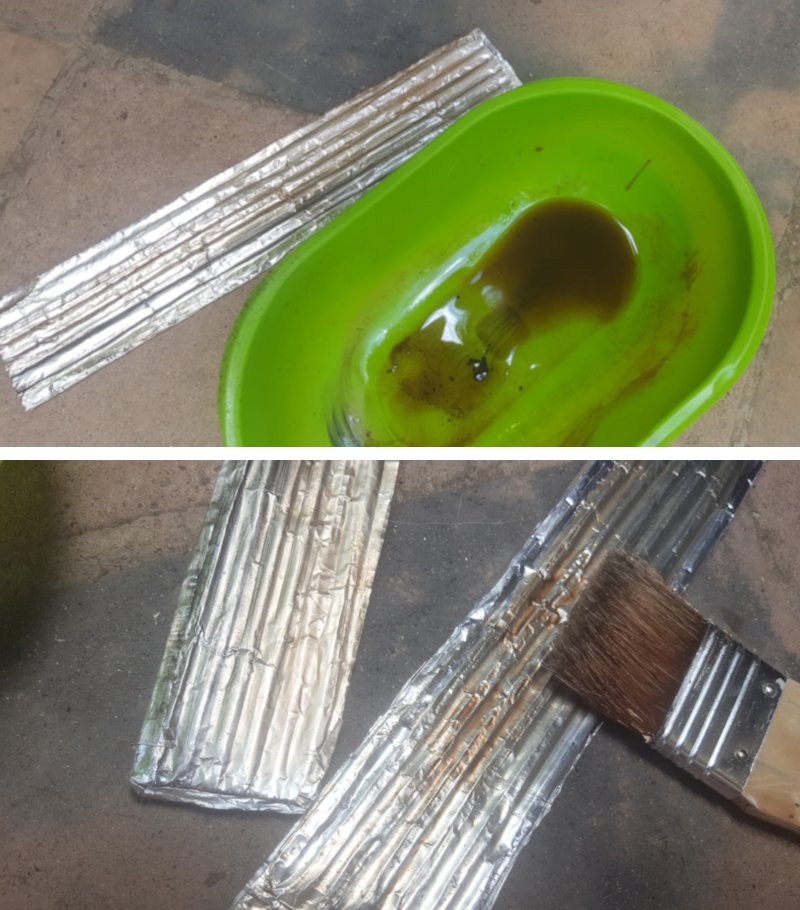 Use oil paint thinned with turpentine to add some faux rust to the roof