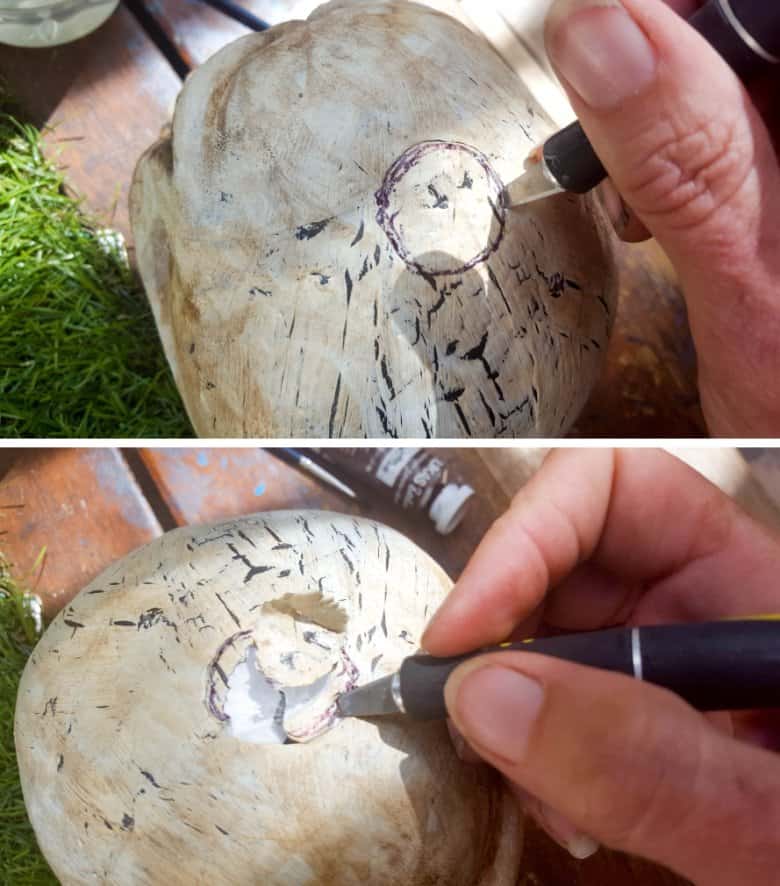 Use a sharp craft knife to cut a hole in the top of the skull's head