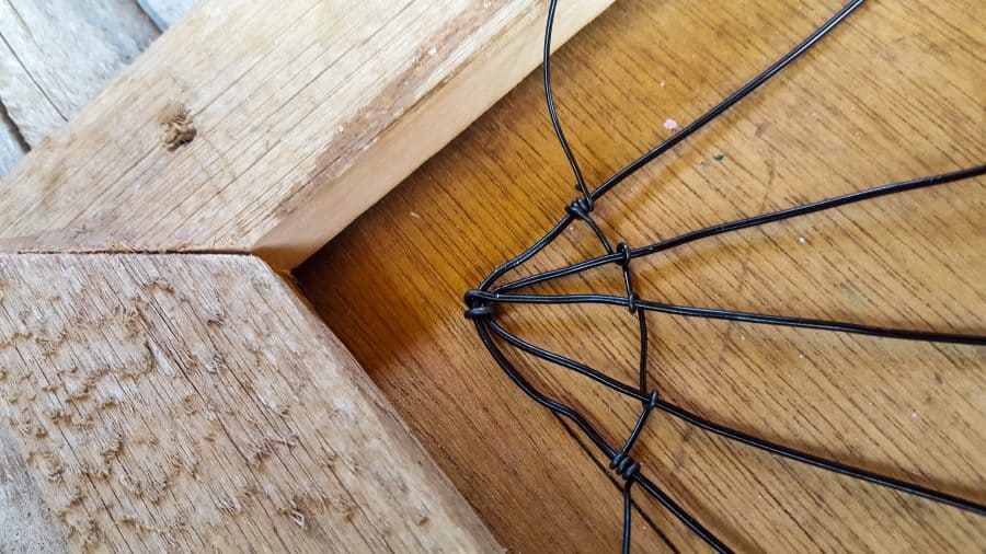 Wind the thinner jewelry wire around the larger strands