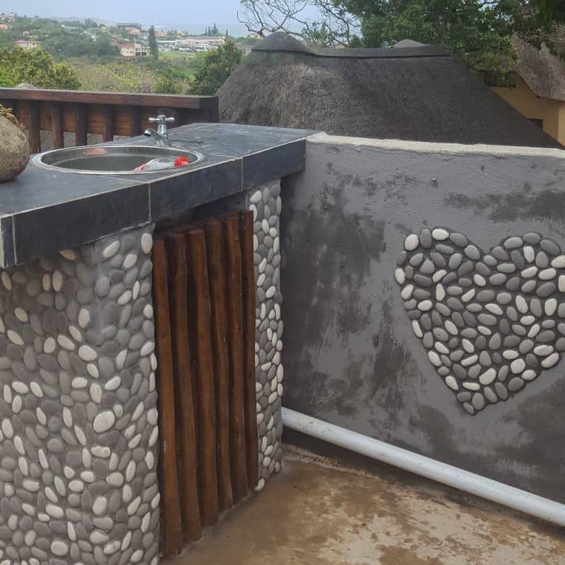 Smear the grout onto raw concrete